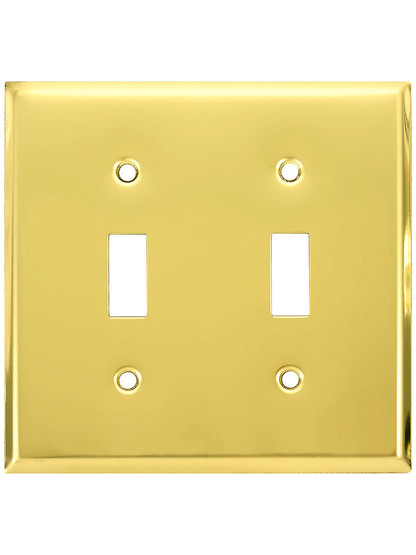 Classic Double Toggle Switch Plate In Polished Brass Finish.